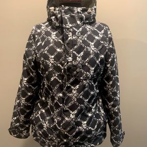 Burton’s snowboarding/ski jacket w/hood. Size :Small. Color:B&W.